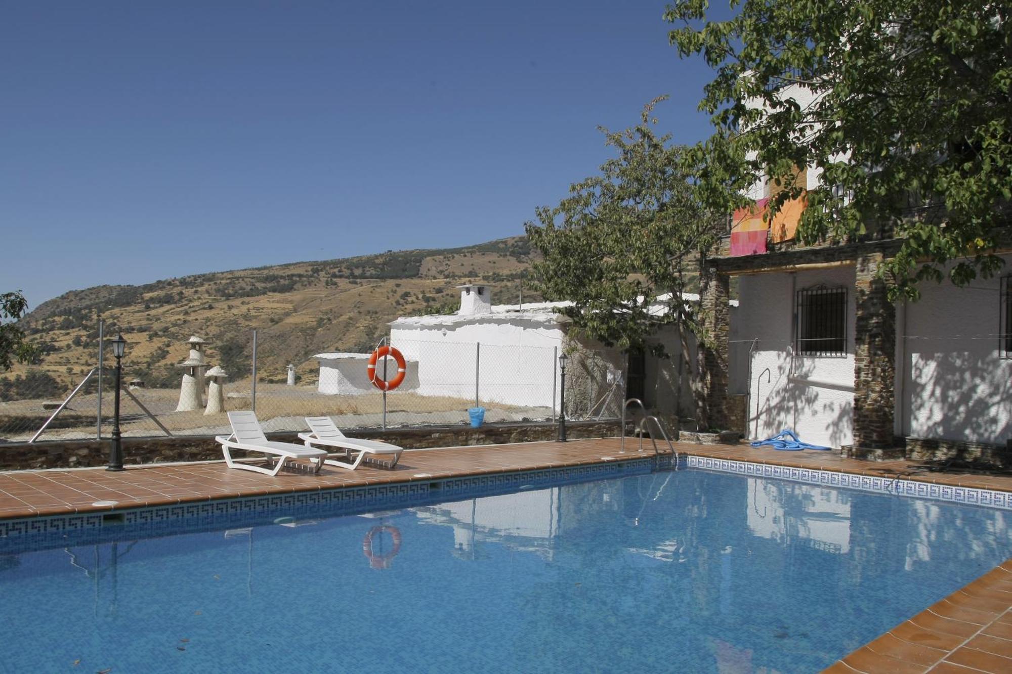 Hostal Rural Poqueira กาปีเลย์รา ภายนอก รูปภาพ